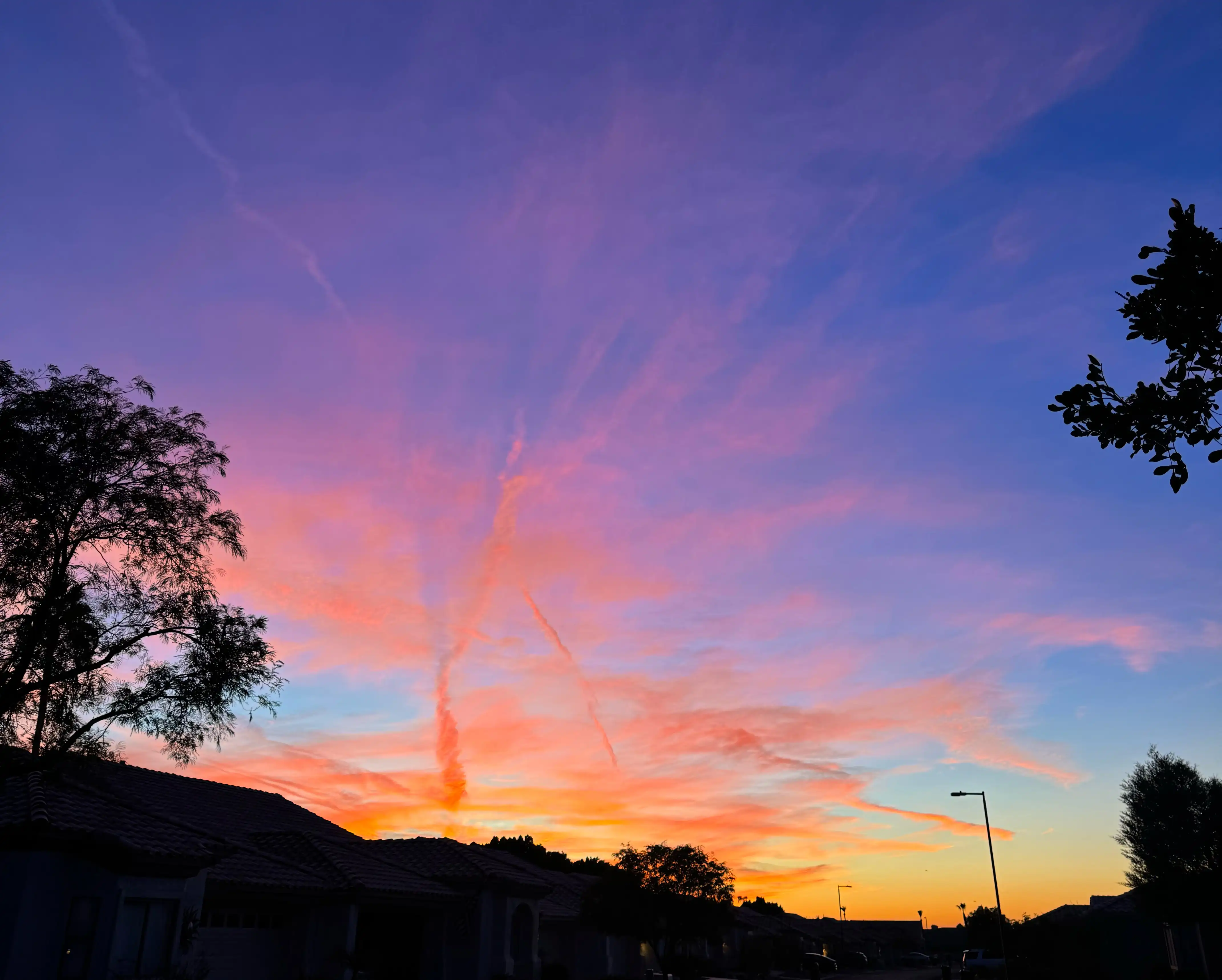 alt: A vibrant multi-colored Arizona sunset